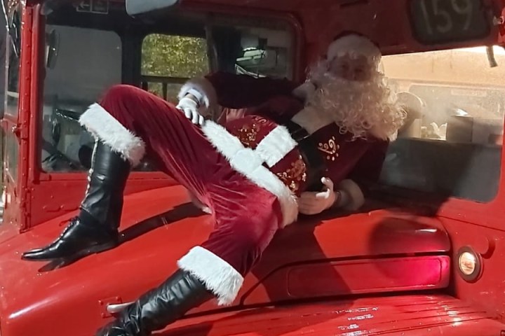 a motorcycle parked in front of a car